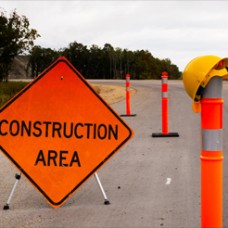 Construction sign that reads 'Construction Area' on the side of a road 